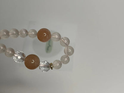 Celestial Delight Bracelet  Starry Pink Quartz, Faceted Clear Quartz, Orange Moonstone, and Fluorite Petal Carvings